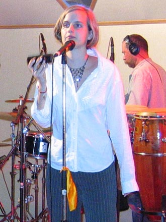 Kim Bastian, vocals and shakers