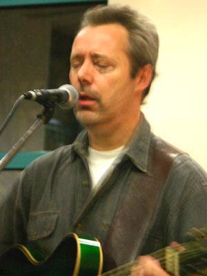 Hugh Featherstone singing at a Candlelight concert for Amnesty International in Viersen