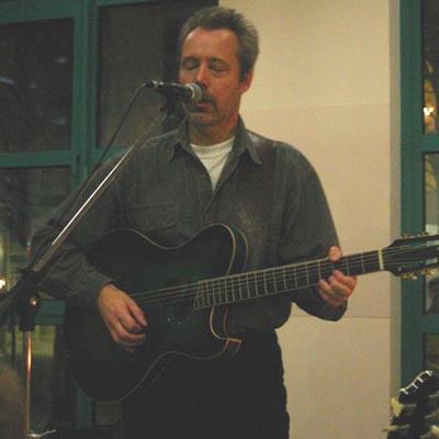 Hugh Featherstone singing at a Candlelight concert